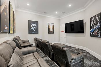 A living room with couches and a tv